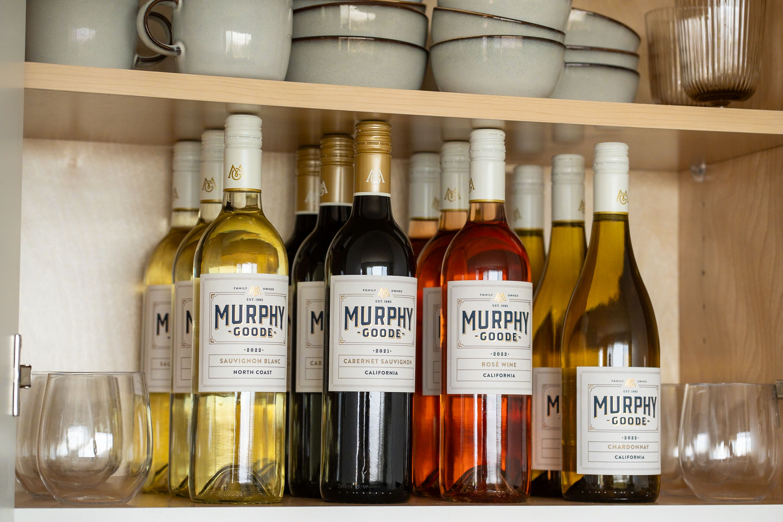 People enjoying Murphy Goode wine while eating cheese